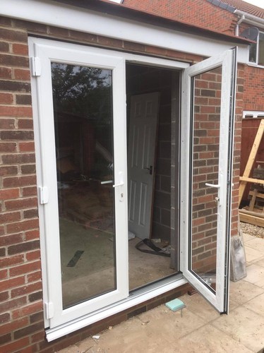 White upvc french doors in - white,